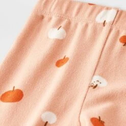 Baby Girls' 2pc Halloween Pumpkin Peplum Flared Leggings Set - Cat & Jack™ Peach Orange 6 Baby Girls' 2pc Halloween Pumpkin Peplum Flared Leggings Set - Cat & Jack™ Peach Orange -Cat & Jack GUEST 1e216cc9 5c1c 48ec bfb2 7c02e69f4536