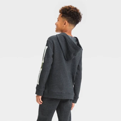 Boys' Skeleton Glow In The Dark Halloween Pullover Sweatshirt - Cat & Jack™ 1 Boys' Skeleton Glow In The Dark Halloween Pullover Sweatshirt - Cat & Jack™